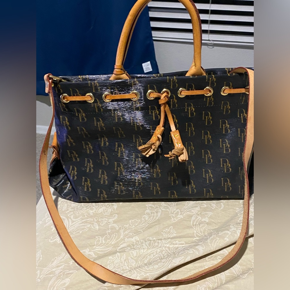 Dooney and bourke 1975 signature
